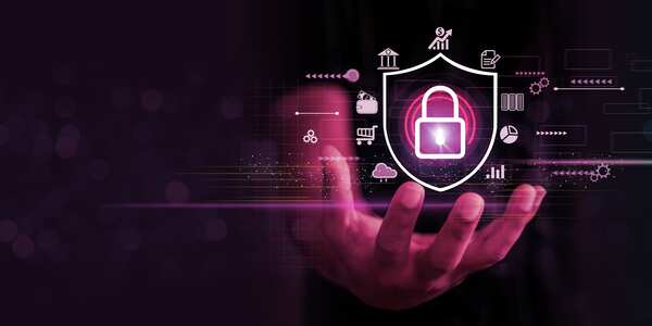 Cybersecurity shield protecting manufacturing data